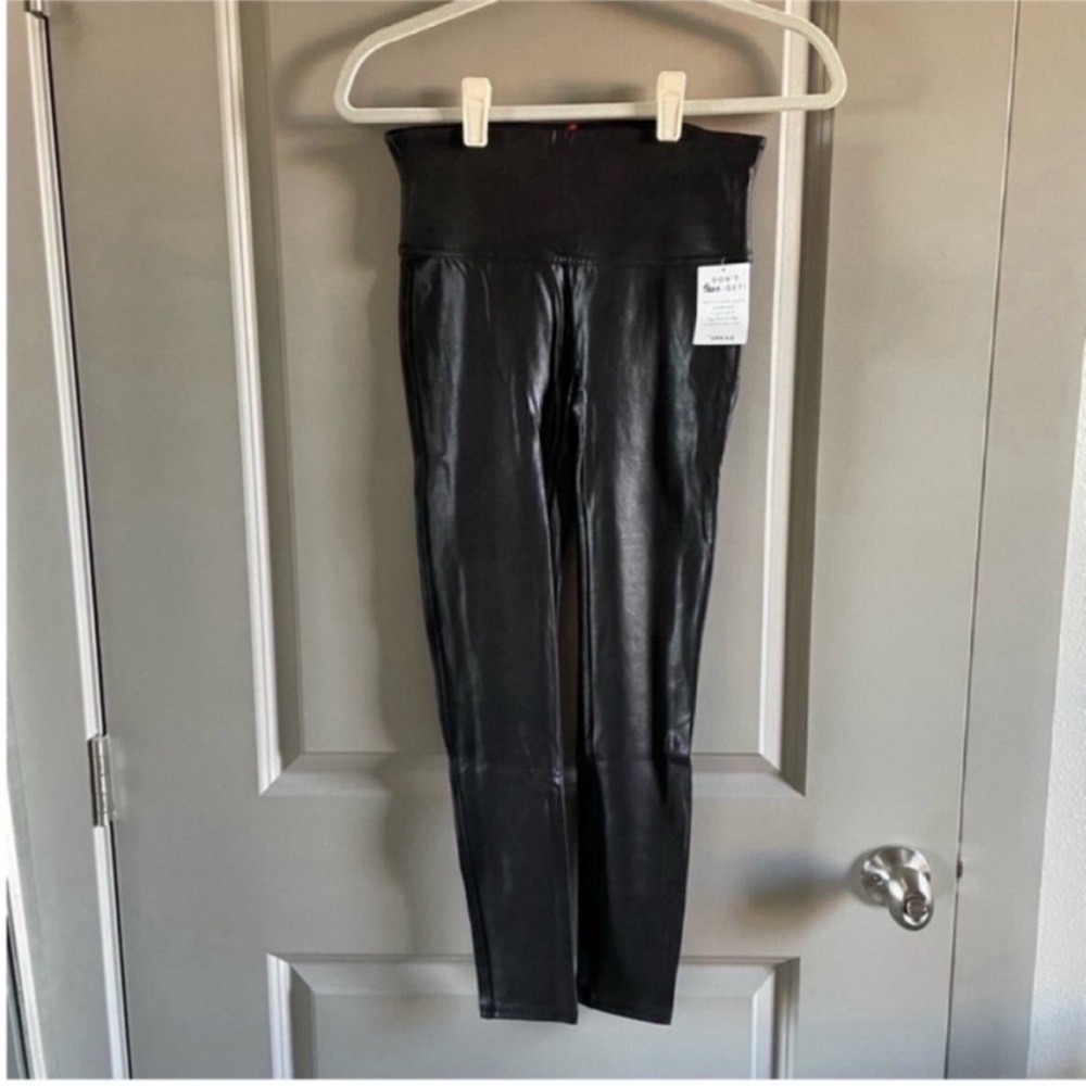 Spanx- black faux leather leggings. Never worn.